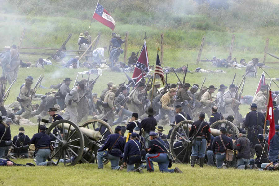 Confederate soldier charge the Union line at Cemetery Ridge during a re-enactment of Pickett's Charge during the 150th anniversary of the Battle of Gettysburg, July 7, 2013 in Gettysburg, Penn.